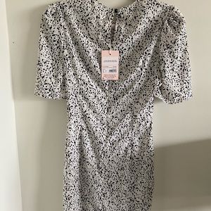 Black & white mini dress w/ cut out in midsection